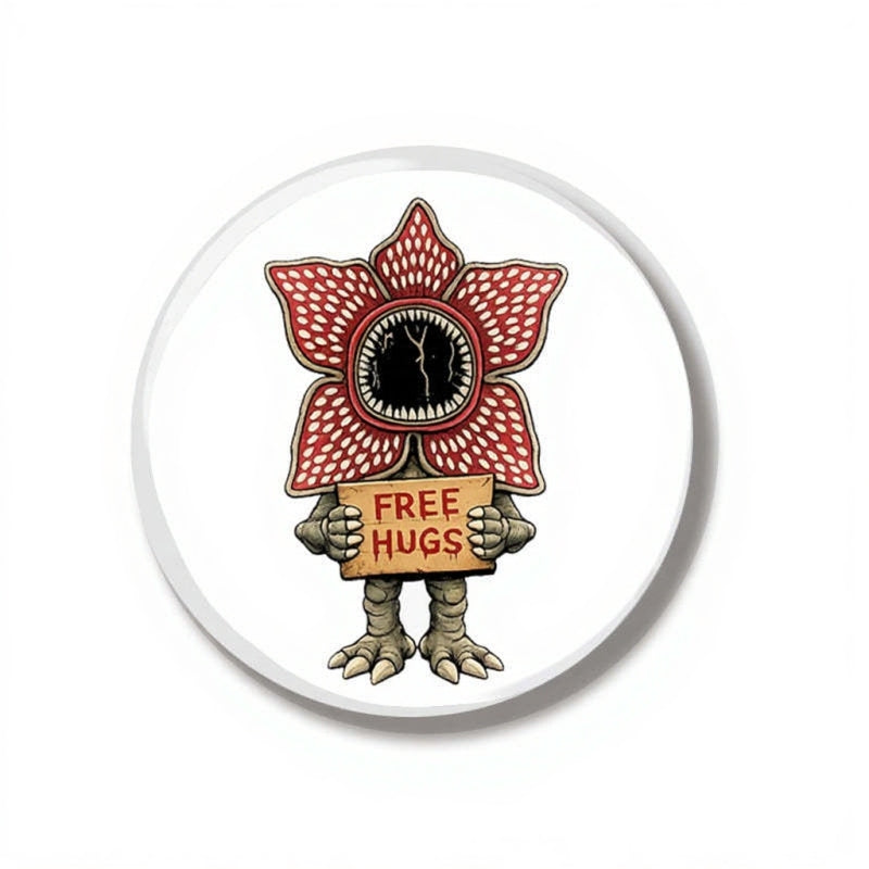 Badge 44 mm Stranger Things Demogorgon Free Hugs vu de face