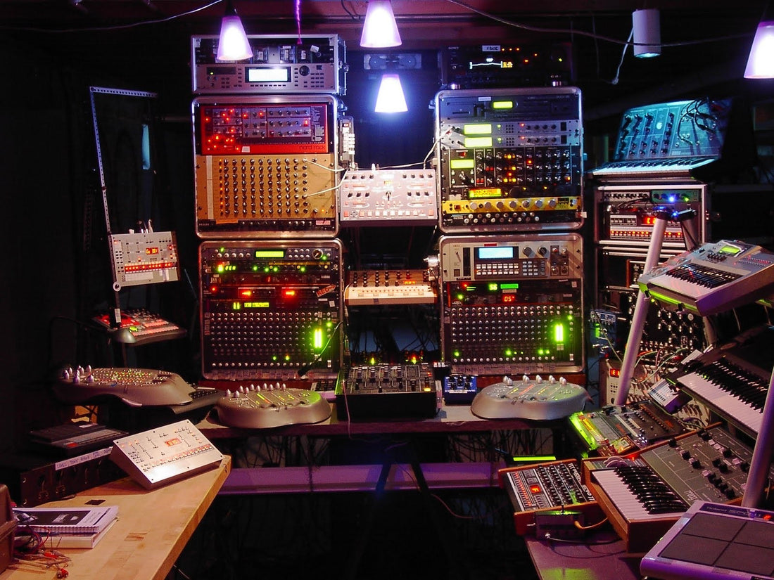 Analog synthesizers in a dark room, cables and diodes